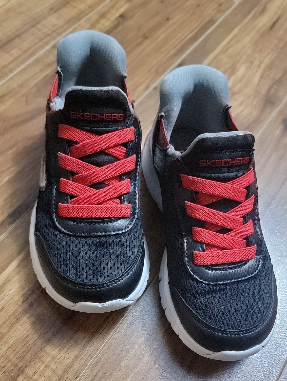 Skechers Kids Black Sneakers with Red Accents